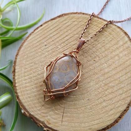 Coral Fossil Jasper Wire Wrapped Pendant, Beige..