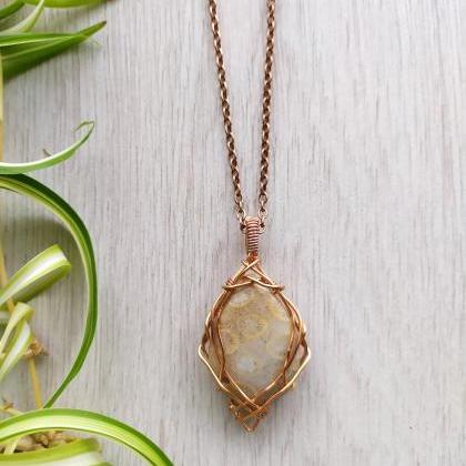 Coral Fossil Jasper Wire Wrapped Pendant, Beige..